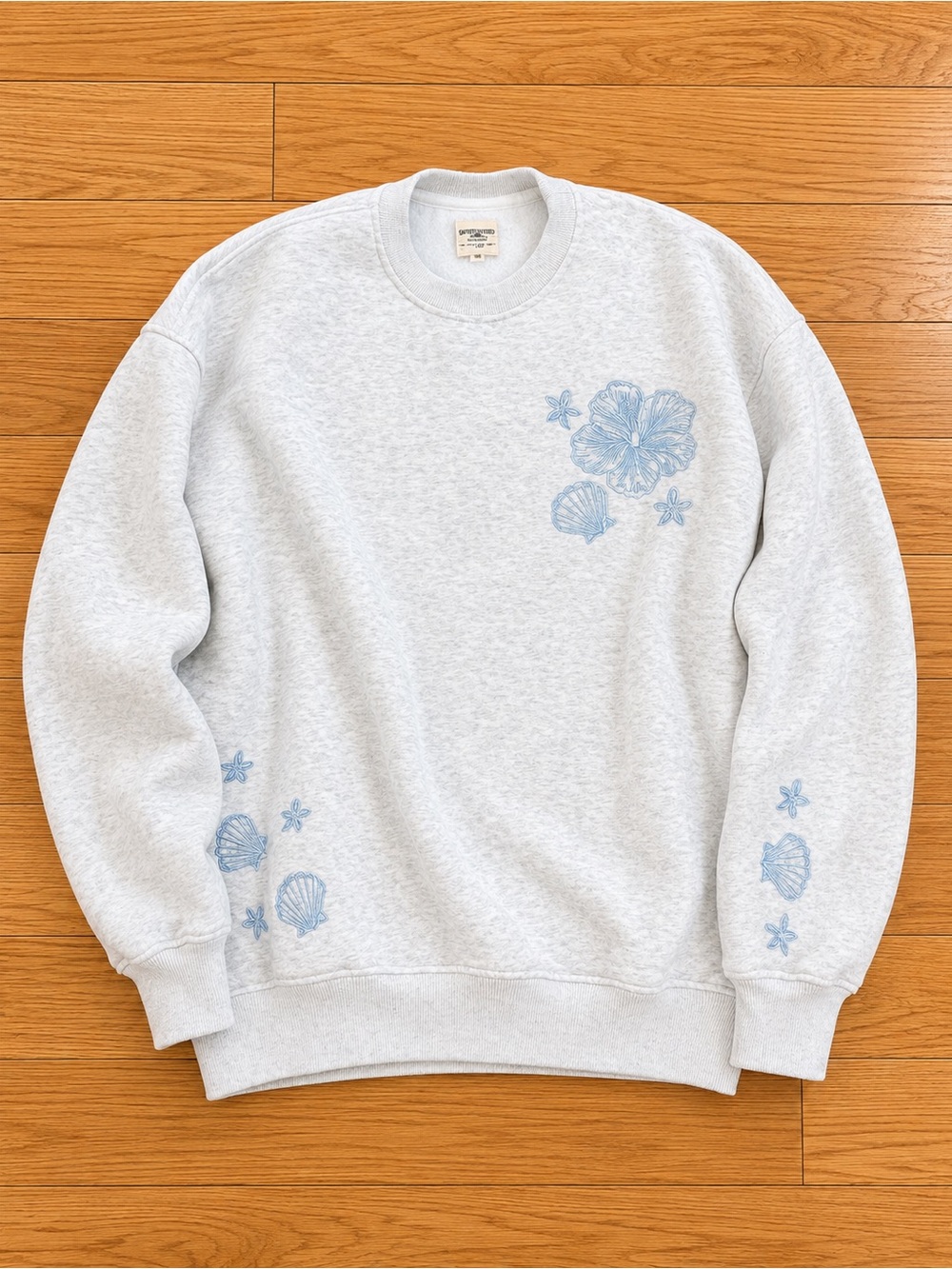 Sun-kissed Coconut Light Gray Crewneck Sweatshirt with Blue Floral Embroidery